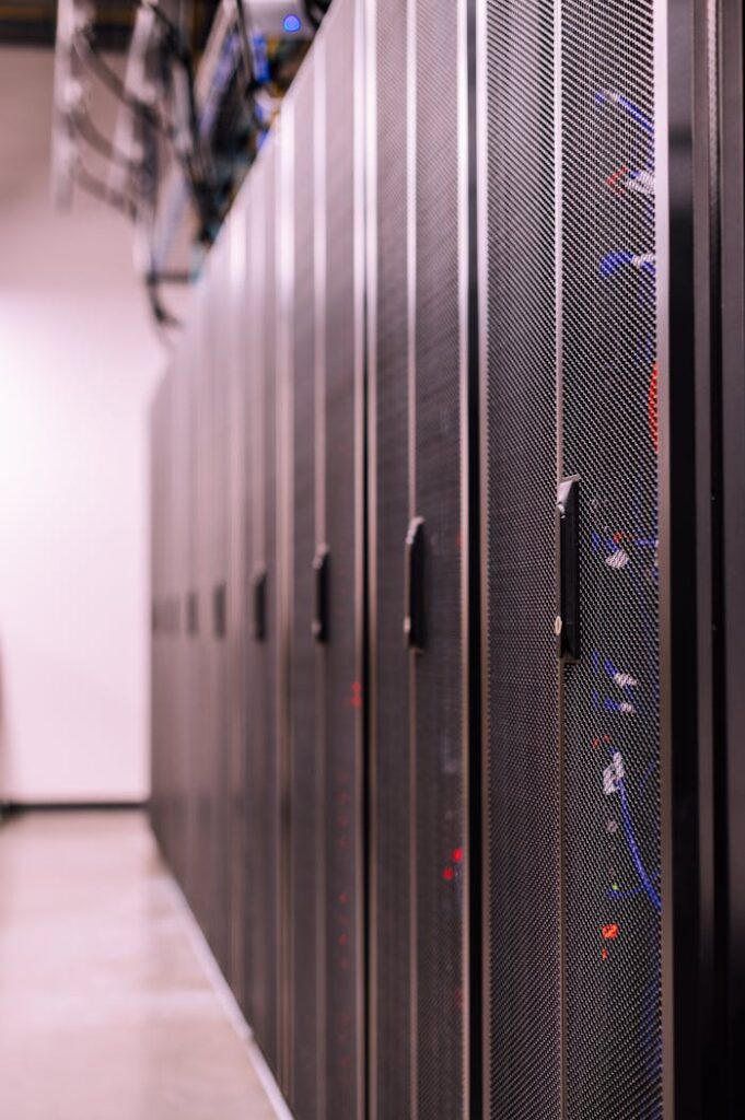 Detailed view of network server racks in a modern data center, highlighting technology infrastructure.